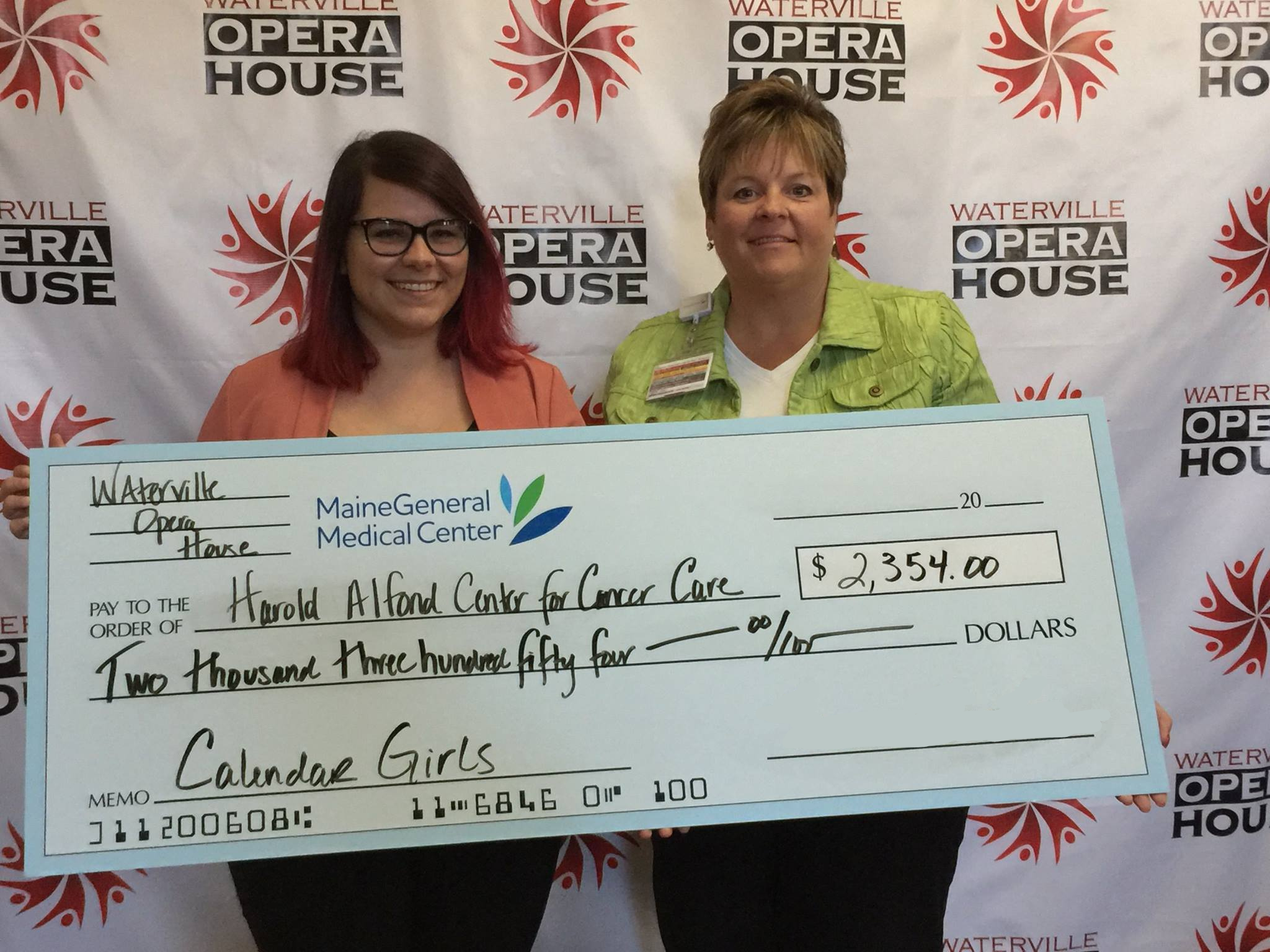 Tamsen Brooke Warner of Waterville Opera House presents donation to Alfond Cancer Center